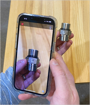 Scan the code on the fitting; a support screen will open with options